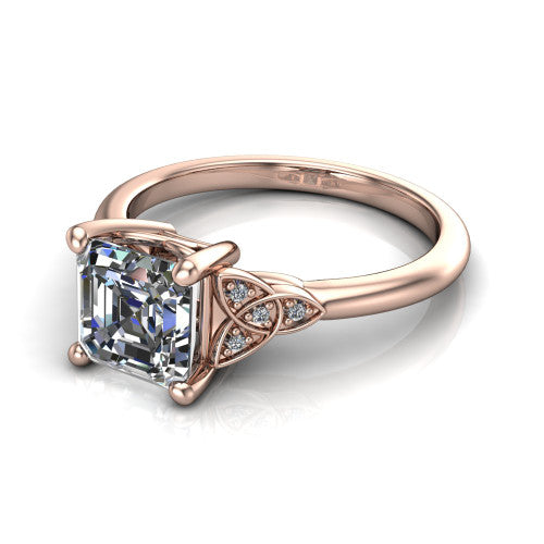 Lilith square emerald solitaire engagement ring in 18K Rose Gold, three-quarter perspective showing the square emerald center diamond with Celtic knot shoulders