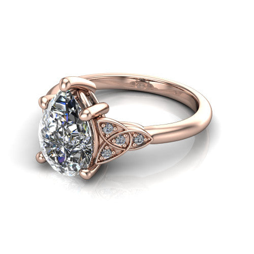 Lilith pear solitaire engagement ring in 18K Rose Gold, three-quarter perspective showing the pear center diamond with Celtic knot shoulders