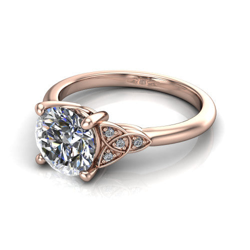 Lilith round solitaire engagement ring in 14K Rose Gold, three-quarter perspective showing the round center diamond with Celtic knot shoulders