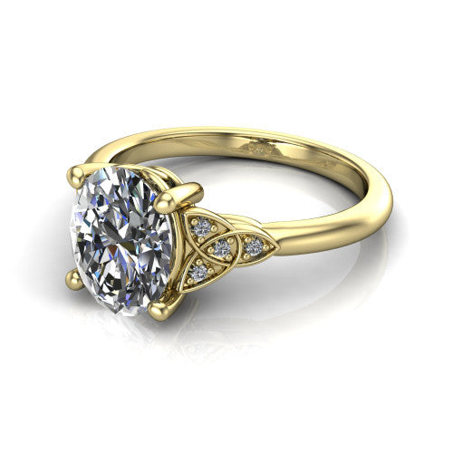 Lilith oval solitaire engagement ring in 18K Yellow Gold, three-quarter perspective showing the oval center diamond with Celtic knot shoulders