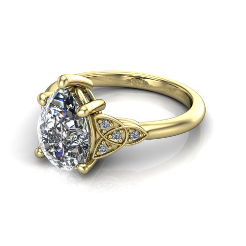 Lilith pear solitaire engagement ring in 14K Yellow Gold, three-quarter perspective showing the pear center diamond with Celtic knot shoulders