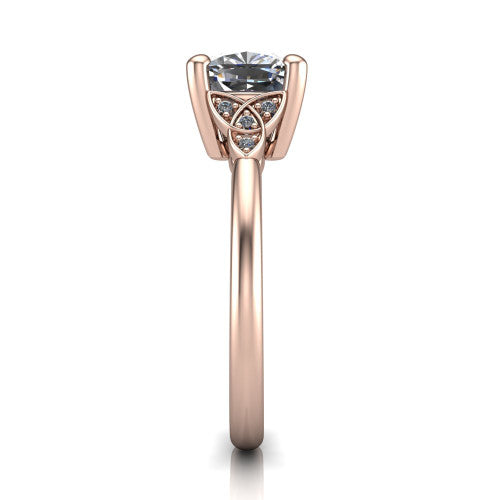 Lilith cushion solitaire engagement ring in 18K Rose Gold, side profile showing the Celtic trinity knot accent and polished band