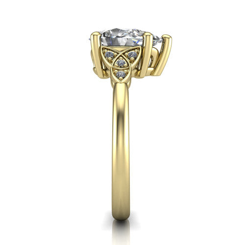 Lilith pear solitaire engagement ring in 18K Yellow Gold, side profile showing the Celtic trinity knot accent and polished band