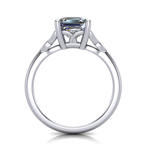 Lilith square emerald solitaire engagement ring in Platinum, through-finger front profile showing the open basket and polished band
