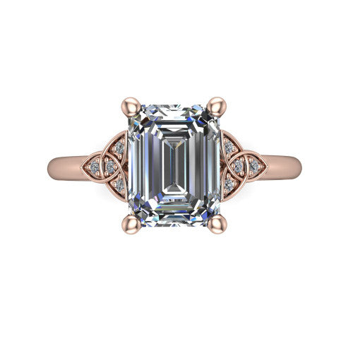 Lilith emerald solitaire engagement ring in 14K Rose Gold, top-down view showing the four-prong emerald center diamond and knot accents