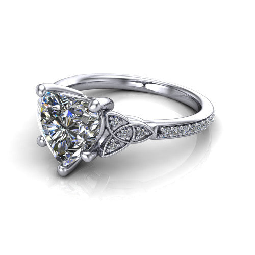 Samara heart-shaped Celtic engagement ring in 18K White Gold, three-quarter perspective showing the heart-shaped center diamond, Celtic trinity-knot shoulders, and pavé band