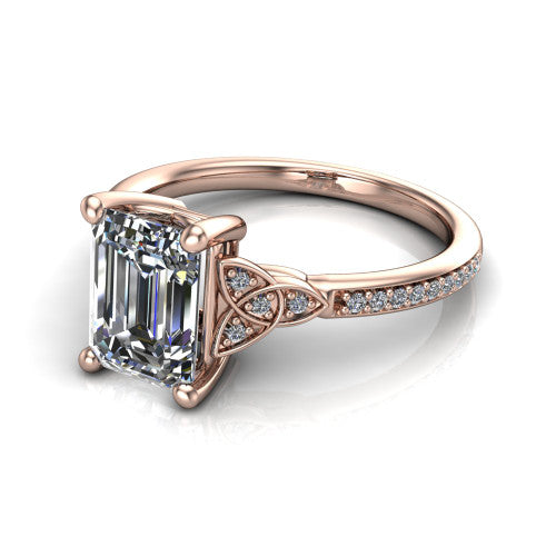 Samara emerald-cut Celtic engagement ring in 18K Rose Gold, three-quarter perspective showing the emerald-cut center diamond, Celtic trinity-knot shoulders, and pavé band