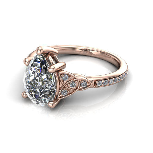 Samara pear-shaped Celtic engagement ring in 14K Rose Gold, three-quarter perspective showing the pear-shaped center diamond, Celtic trinity-knot shoulders, and pavé band