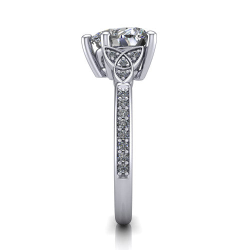 Samara heart-shaped Celtic engagement ring in Platinum, side profile showing the Celtic knot shoulder and pavé band