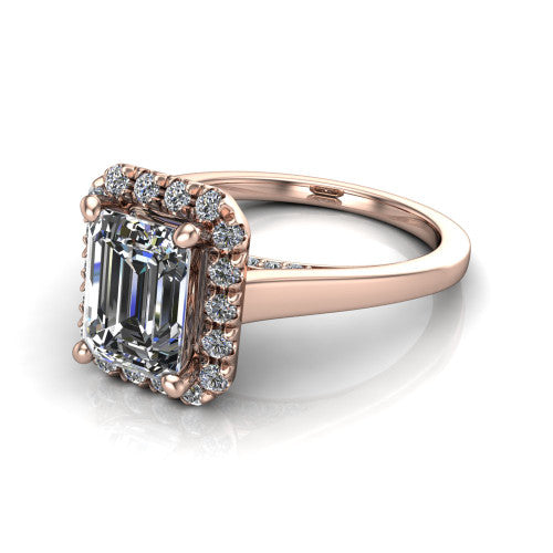 Helen emerald-cut halo engagement ring in 14K Rose Gold, three-quarter perspective showing the emerald-cut center diamond, pavé halo, and polished band