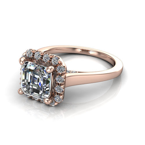 Helen square emerald-cut halo engagement ring in 14K Rose Gold, three-quarter perspective showing the square emerald-cut center diamond, pavé halo, and polished band