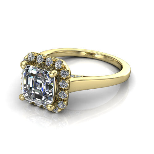 Helen square emerald-cut halo engagement ring in 14K Yellow Gold, three-quarter perspective showing the square emerald-cut center diamond, pavé halo, and polished band