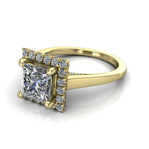 Helen princess-cut halo engagement ring in 18K Yellow Gold, three-quarter perspective showing the princess-cut center diamond, pavé halo, and polished band