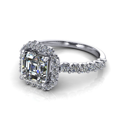 Mabel square emerald halo engagement ring in Platinum, three-quarter perspective showing the square emerald center diamond in a pave halo above a shared-prong pave band