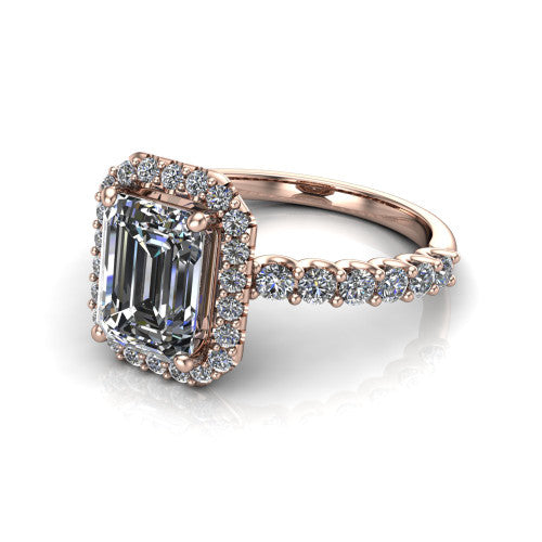 Mabel emerald halo engagement ring in 14K Rose Gold, three-quarter perspective showing the emerald center diamond in a pave halo above a shared-prong pave band