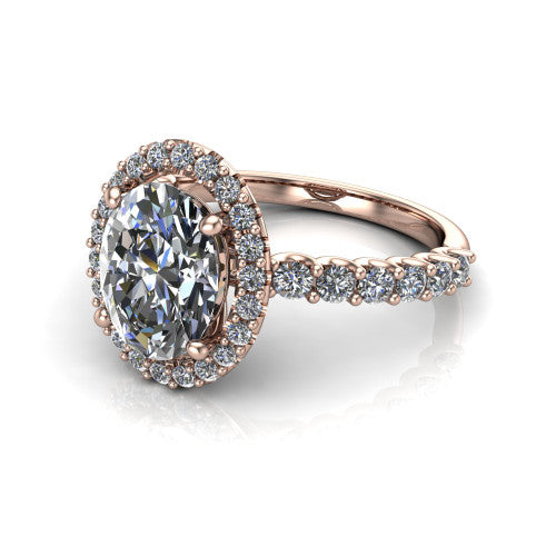 Mabel oval halo engagement ring in 18K Rose Gold, three-quarter perspective showing the oval center diamond in a pave halo above a shared-prong pave band
