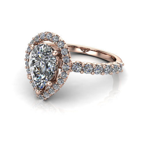Mabel pear halo engagement ring in 18K Rose Gold, three-quarter perspective showing the pear center diamond in a pave halo above a shared-prong pave band