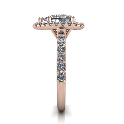Mabel pear halo engagement ring in 14K Rose Gold, side profile showing the pave band and open basket