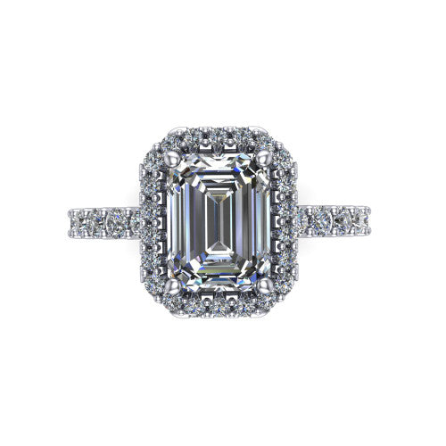 Mabel emerald halo engagement ring in 18K White Gold, top-down view showing the emerald center diamond framed by a pave halo