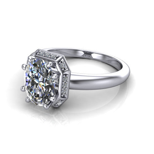 Maris oval vintage halo engagement ring in Platinum, three-quarter perspective showing the oval center diamond, octagonal milgrain halo, and polished band
