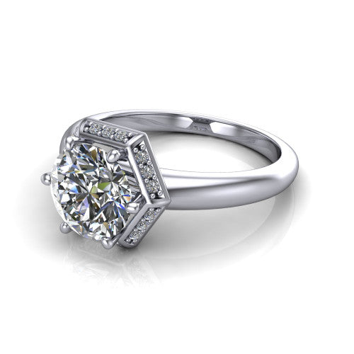 Maris round vintage halo engagement ring in 18K White Gold, three-quarter perspective showing the round center diamond, octagonal milgrain halo, and polished band