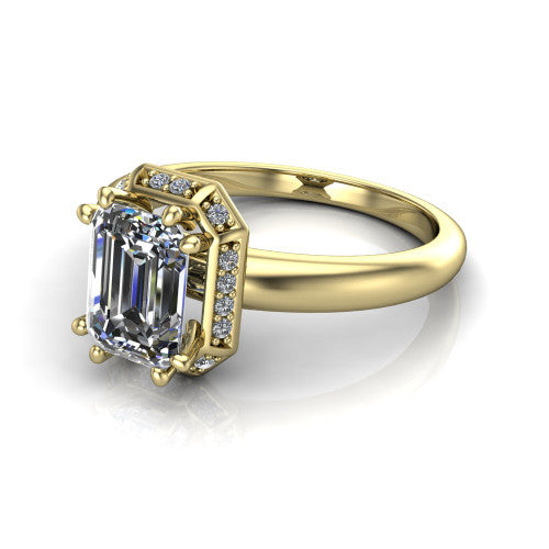 Maris emerald-cut vintage halo engagement ring in 18K Yellow Gold, three-quarter perspective showing the emerald-cut center diamond, octagonal milgrain halo, and polished band