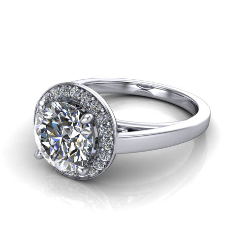 Coralie round halo engagement ring in 14K White Gold, three-quarter perspective showing the round center diamond, milgrain pavé halo, and polished band