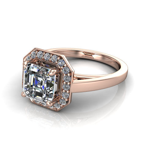 Coralie square emerald-cut halo engagement ring in 18K Rose Gold, three-quarter perspective showing the square emerald-cut center diamond, milgrain pavé halo, and polished band