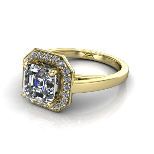 Coralie square emerald-cut halo engagement ring in 14K Yellow Gold, three-quarter perspective showing the square emerald-cut center diamond, milgrain pavé halo, and polished band