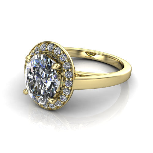 Coralie oval halo engagement ring in 14K Yellow Gold, three-quarter perspective showing the oval center diamond, milgrain pavé halo, and polished band