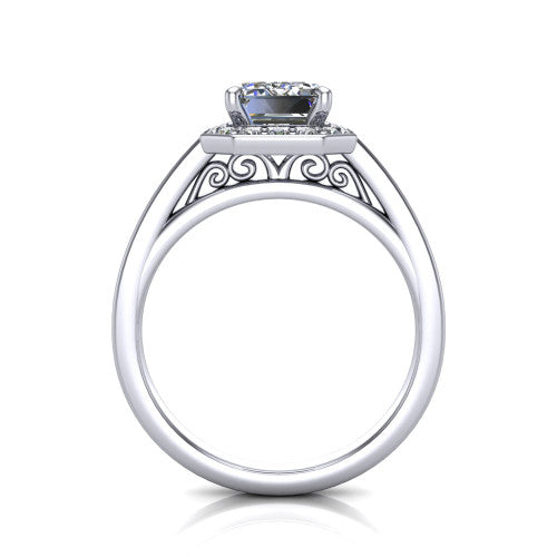 Coralie emerald-cut halo engagement ring in Platinum, through-finger front profile showing the filigree scrollwork gallery beneath the halo