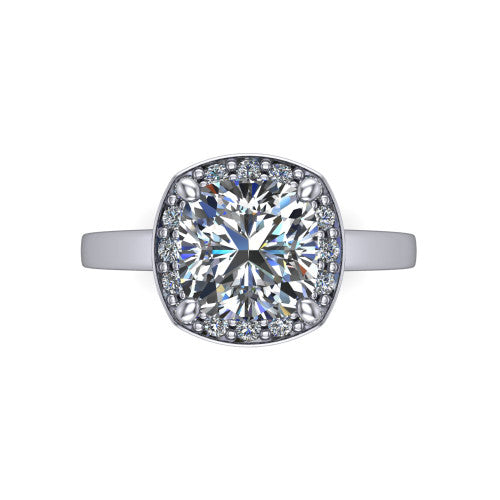 Coralie cushion-cut halo engagement ring in Platinum, top-down view showing the cushion-cut center diamond framed by the milgrain pavé halo