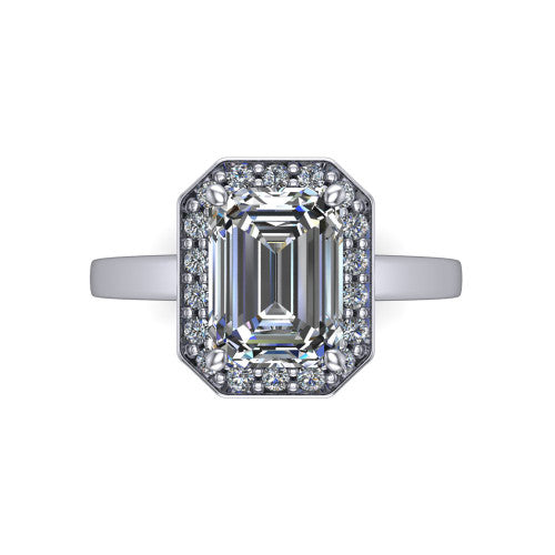 Coralie emerald-cut halo engagement ring in 18K White Gold, top-down view showing the emerald-cut center diamond framed by the milgrain pavé halo