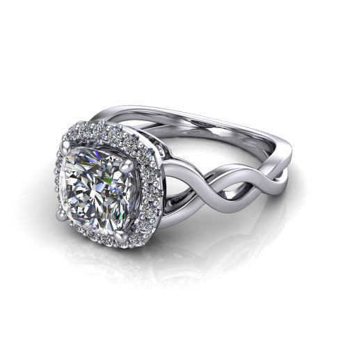 Demi cushion-cut halo engagement ring in Platinum, three-quarter perspective showing the cushion-cut center diamond, pavé halo, and infinity-twist shank