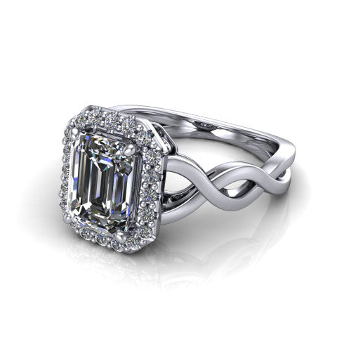 Demi emerald-cut halo engagement ring in 14K White Gold, three-quarter perspective showing the emerald-cut center diamond, pavé halo, and infinity-twist shank