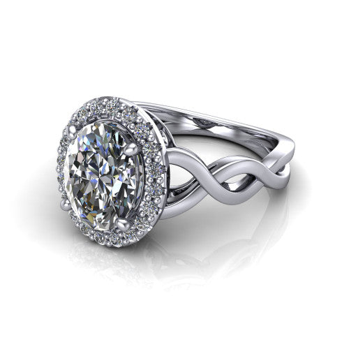 Demi oval halo engagement ring in Platinum, three-quarter perspective showing the oval center diamond, pavé halo, and infinity-twist shank