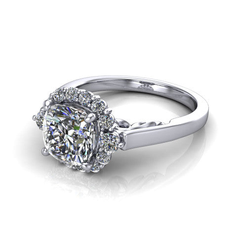 Elise cushion halo engagement ring in Platinum, three-quarter perspective showing the cushion center diamond in a vintage cluster halo above a polished band