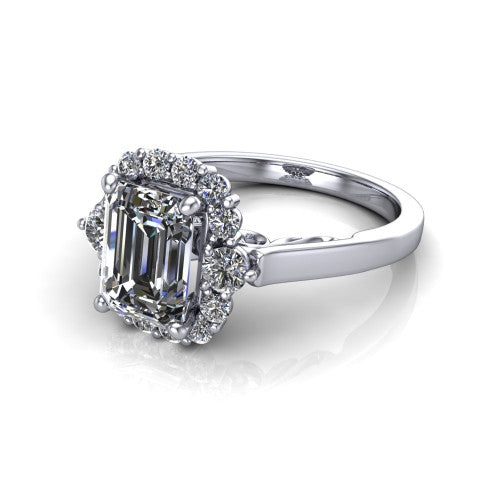 Elise emerald halo engagement ring in 18K White Gold, three-quarter perspective showing the emerald center diamond in a vintage cluster halo above a polished band