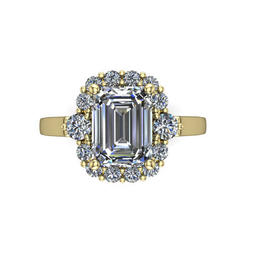 Elise emerald halo engagement ring in 18K Yellow Gold, top-down view showing the emerald center diamond framed by a cluster halo of round diamonds