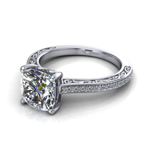 Nicole cushion solitaire engagement ring in 14K White Gold, three-quarter perspective showing the cushion center diamond above a pave band with scrollwork engraving