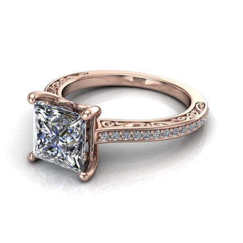 Nicole princess solitaire engagement ring in 14K Rose Gold, three-quarter perspective showing the princess center diamond above a pave band with scrollwork engraving