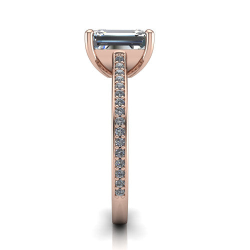 Nicole emerald solitaire engagement ring in 14K Rose Gold, side profile showing the vintage scrollwork engraving on the band