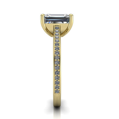 Nicole emerald solitaire engagement ring in 14K Yellow Gold, side profile showing the vintage scrollwork engraving on the band