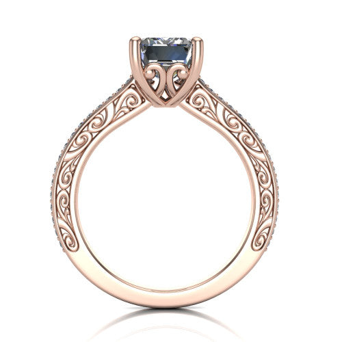 Nicole emerald solitaire engagement ring in 18K Rose Gold, through-finger front profile showing the filigree scrollwork gallery