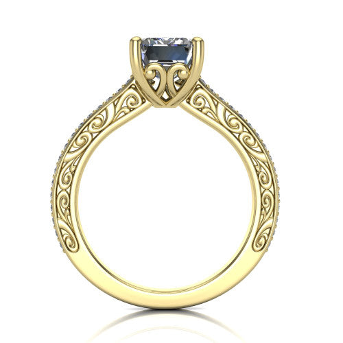 Nicole emerald solitaire engagement ring in 18K Yellow Gold, through-finger front profile showing the filigree scrollwork gallery