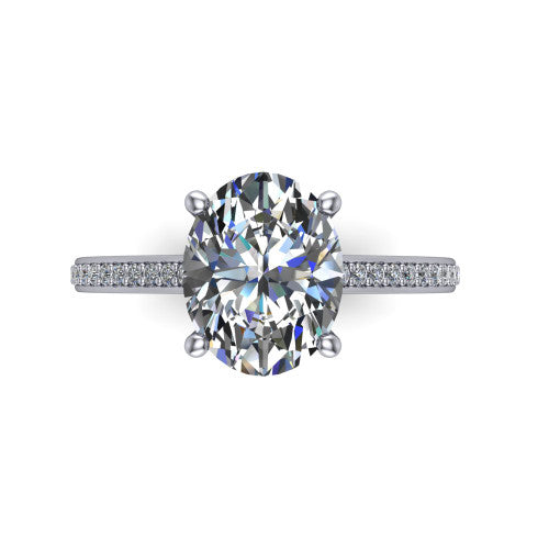 Nicole oval solitaire engagement ring in 18K White Gold, top-down view showing the four-prong oval center diamond and pave band