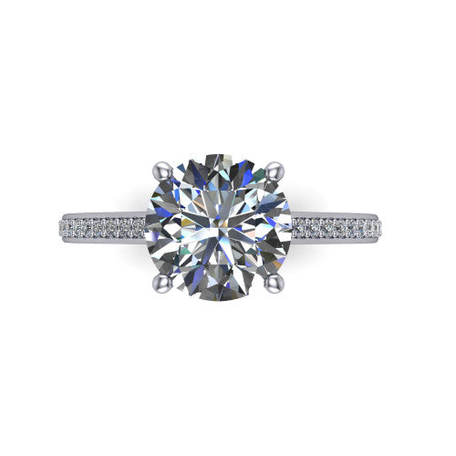 Nicole round solitaire engagement ring in 14K White Gold, top-down view showing the four-prong round center diamond and pave band