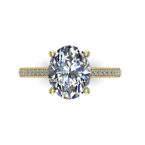 Nicole oval solitaire engagement ring in 14K Yellow Gold, top-down view showing the four-prong oval center diamond and pave band