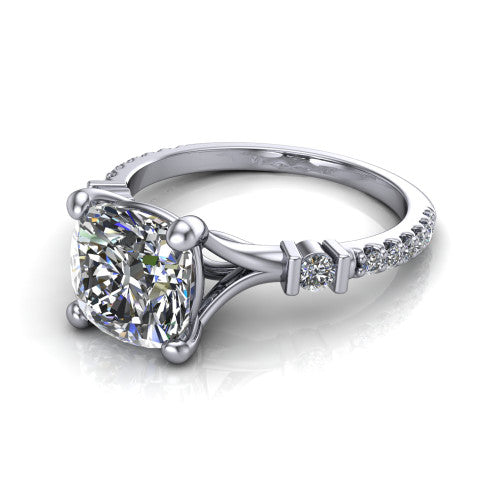 Arabella cushion solitaire engagement ring in 18K White Gold, three-quarter perspective showing the cushion center diamond above a pave band with bezel-set shoulder accents