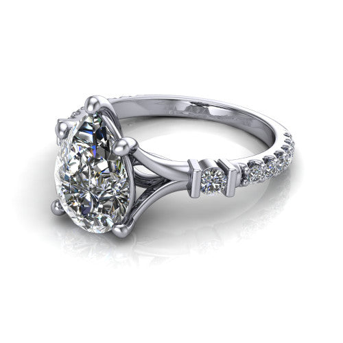 Arabella pear solitaire engagement ring in 14K White Gold, three-quarter perspective showing the pear center diamond above a pave band with bezel-set shoulder accents